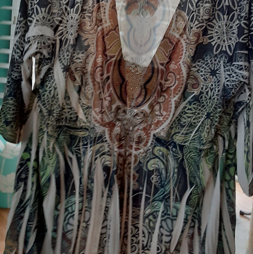 Women's top in green, cream, beige